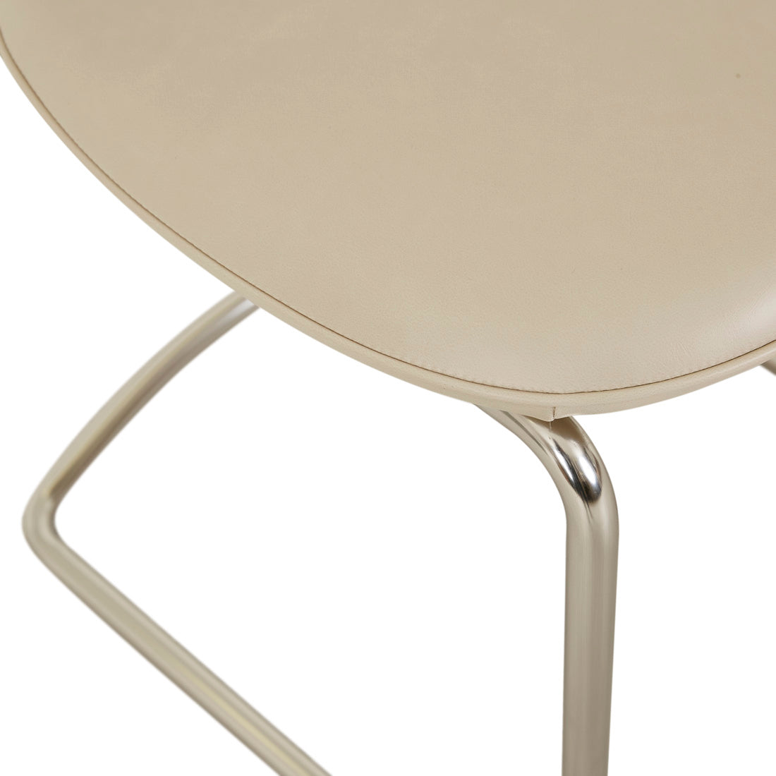 PICCOLO CANTILEVER DINING CHAIR in Sandstone PU / Brushed Chrome by GlobeWest at Darling & Domain