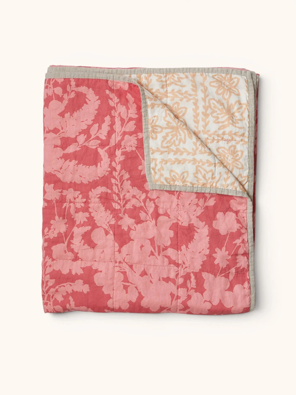 DAISY BUFF QUILTED THROW in Petal Pink from Bonnie and Neil