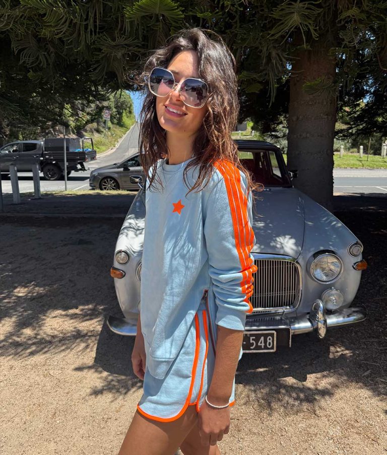 ARM STRIPE SWEATSHIRT in Baby Blue + Orange from Sophie Moran