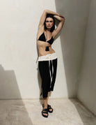 BUCKLE STRAP SLIDE in Black by La Tribe