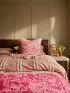DAISY BUFF QUILTED THROW in Petal Pink from Bonnie and Neil