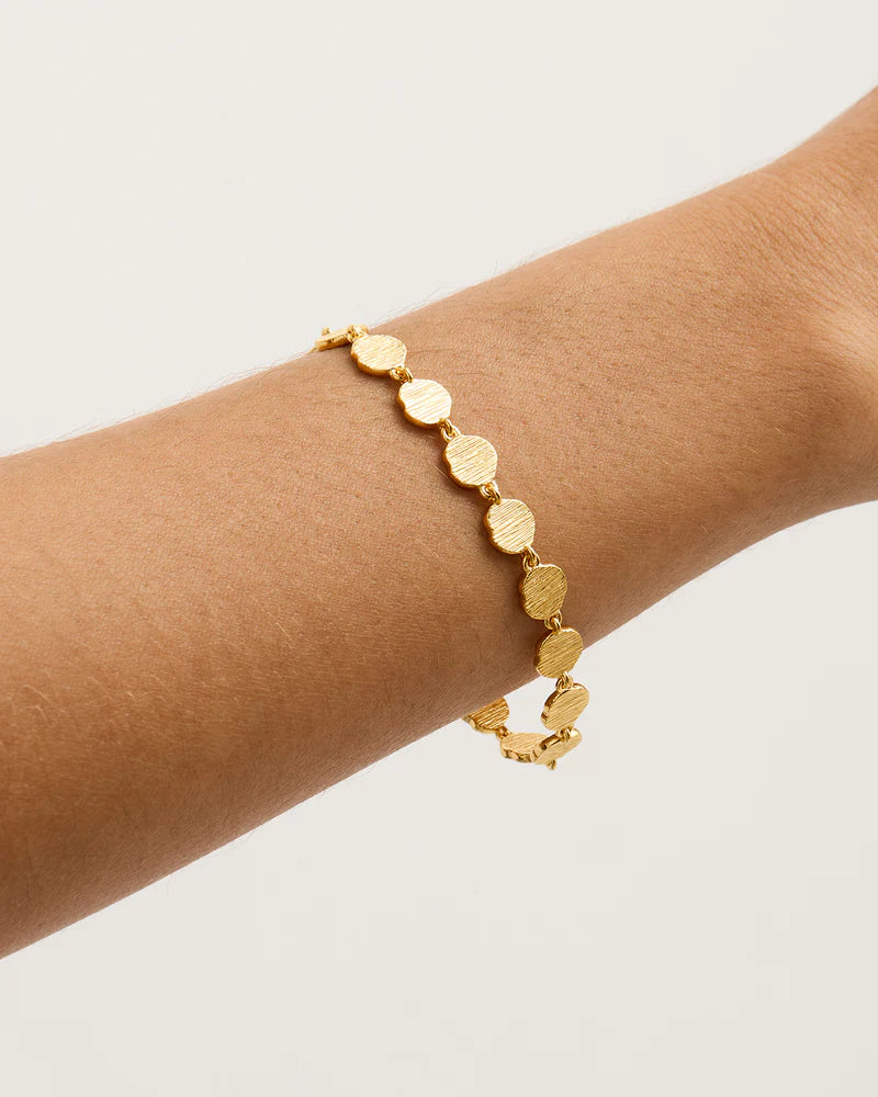 WOVEN LIGHT COIN BRACELET in Gold from By Charlotte