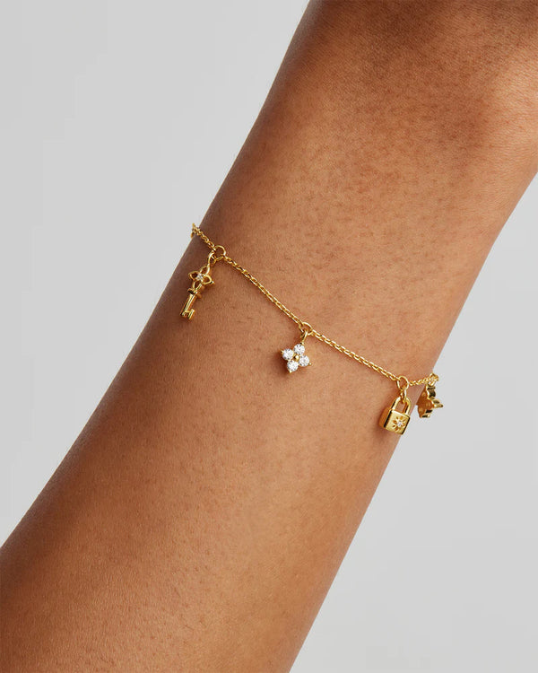 LOVE UNLOCKED CHARM BRACELET in 18k Gold Vermeil from By Charlotte