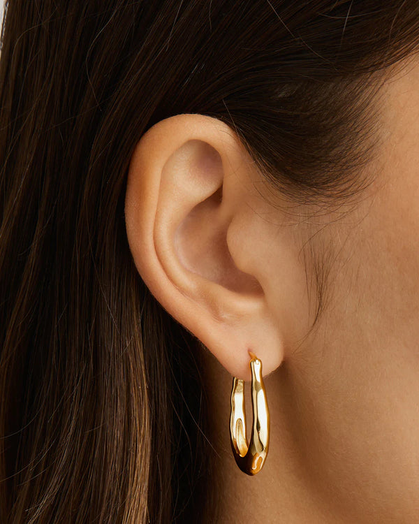 RADIANT ENERGY HOOPS LARGE in Gold from By Charlotte