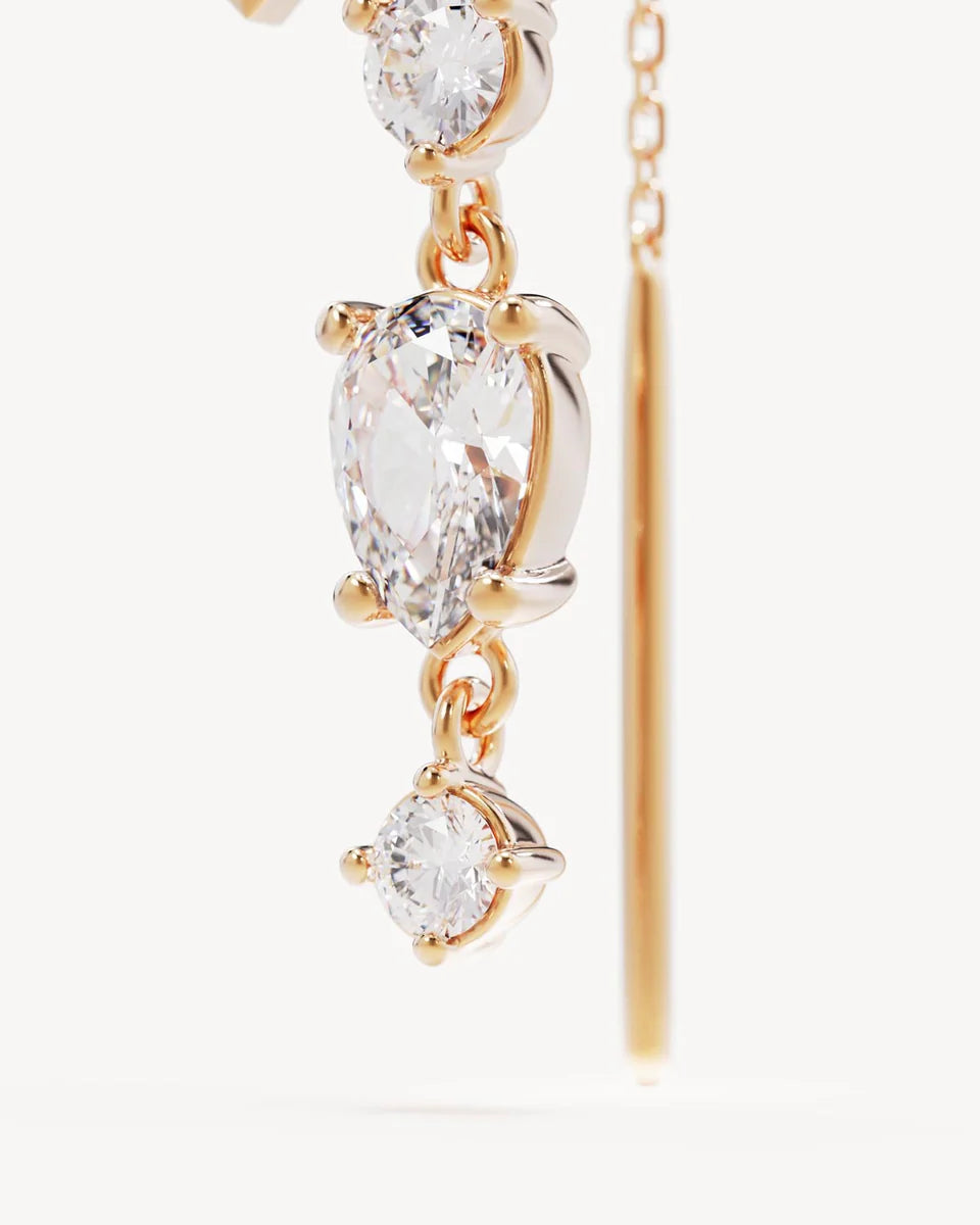 LOTUS RAIN THREAD EARRINGS in 18K Gold Vermeil from By Charlotte